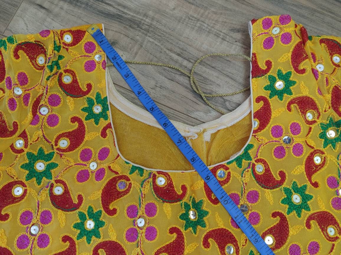Elegant Readymade Yellow Pulkari Rajasthani Blouse that goes with any saree collection you have in your closet